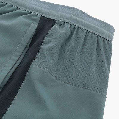 M NK DF STRIDE 5IN SHRT HYBRID