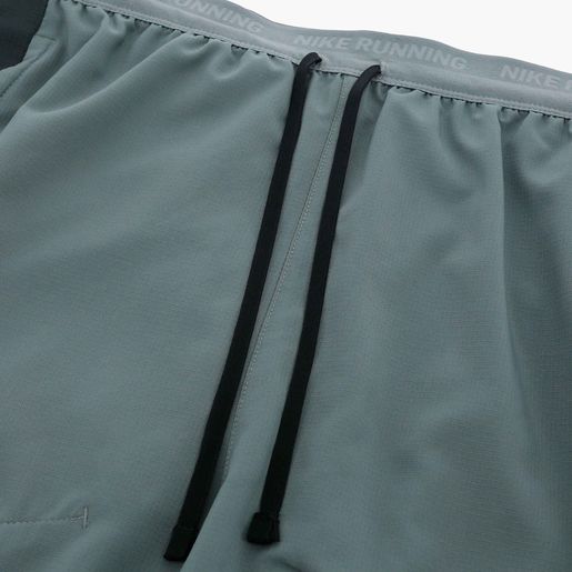 M NK DF STRIDE 5IN SHRT HYBRID